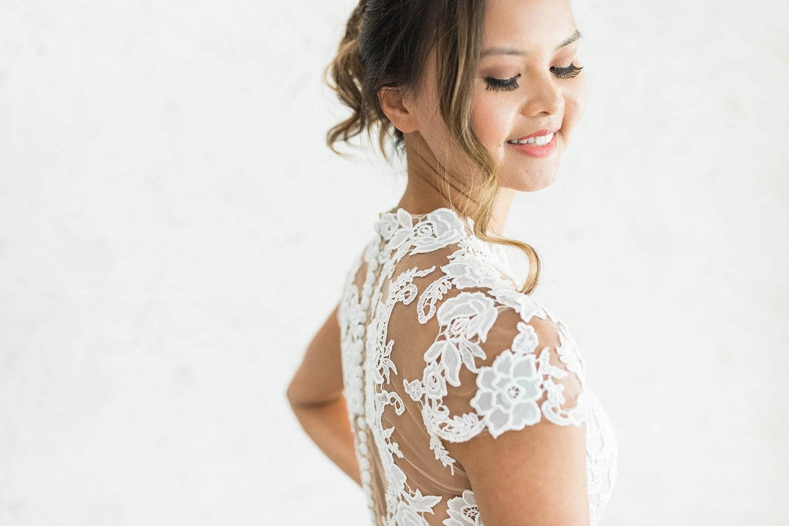 Model wearing a capped sleeves gown