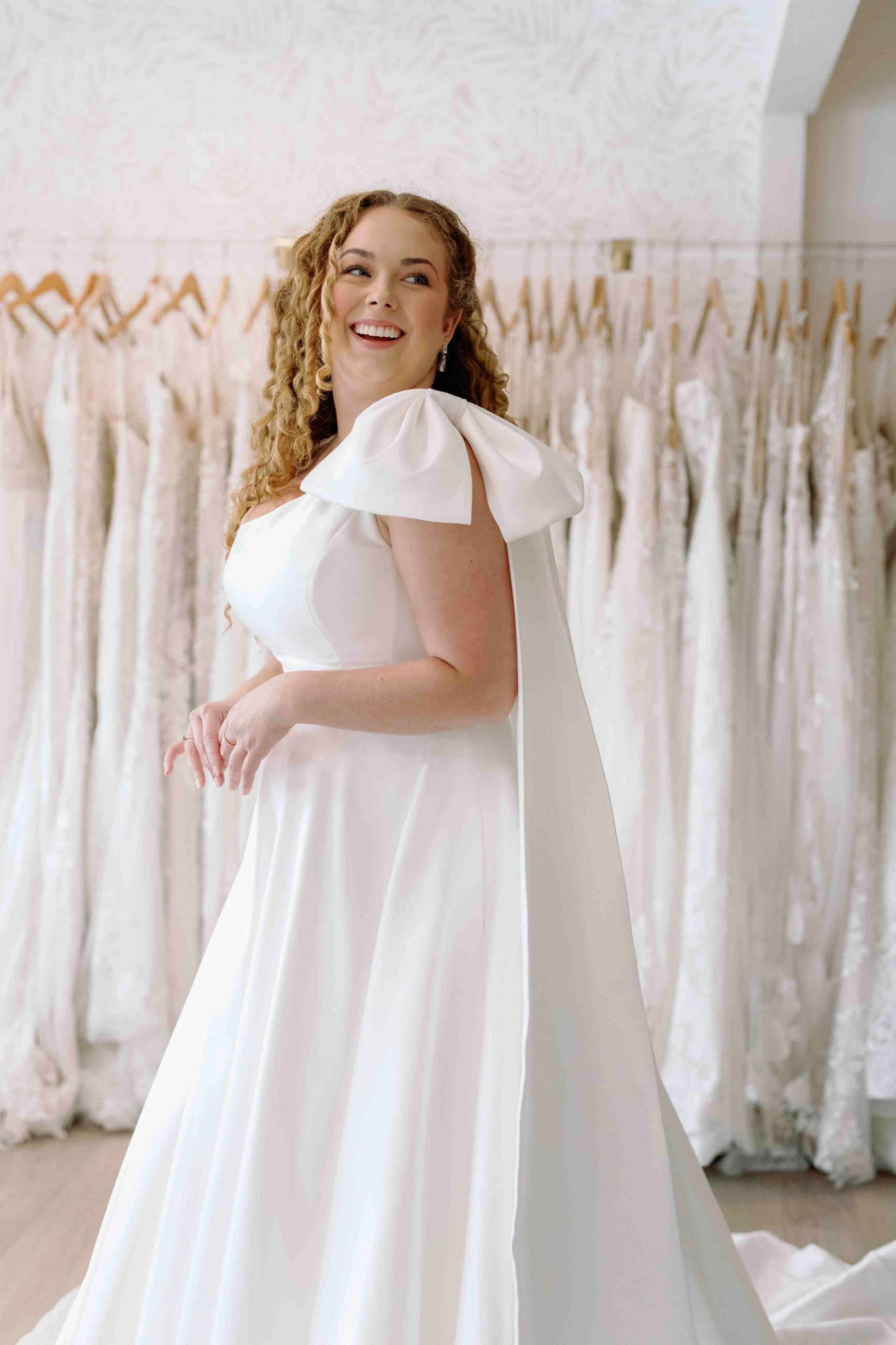 Model wearing a Justin Alexander Gown