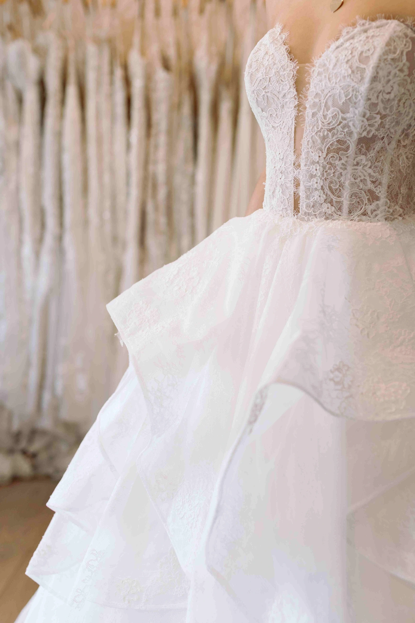 Model wearing a Justin Alexander Gown