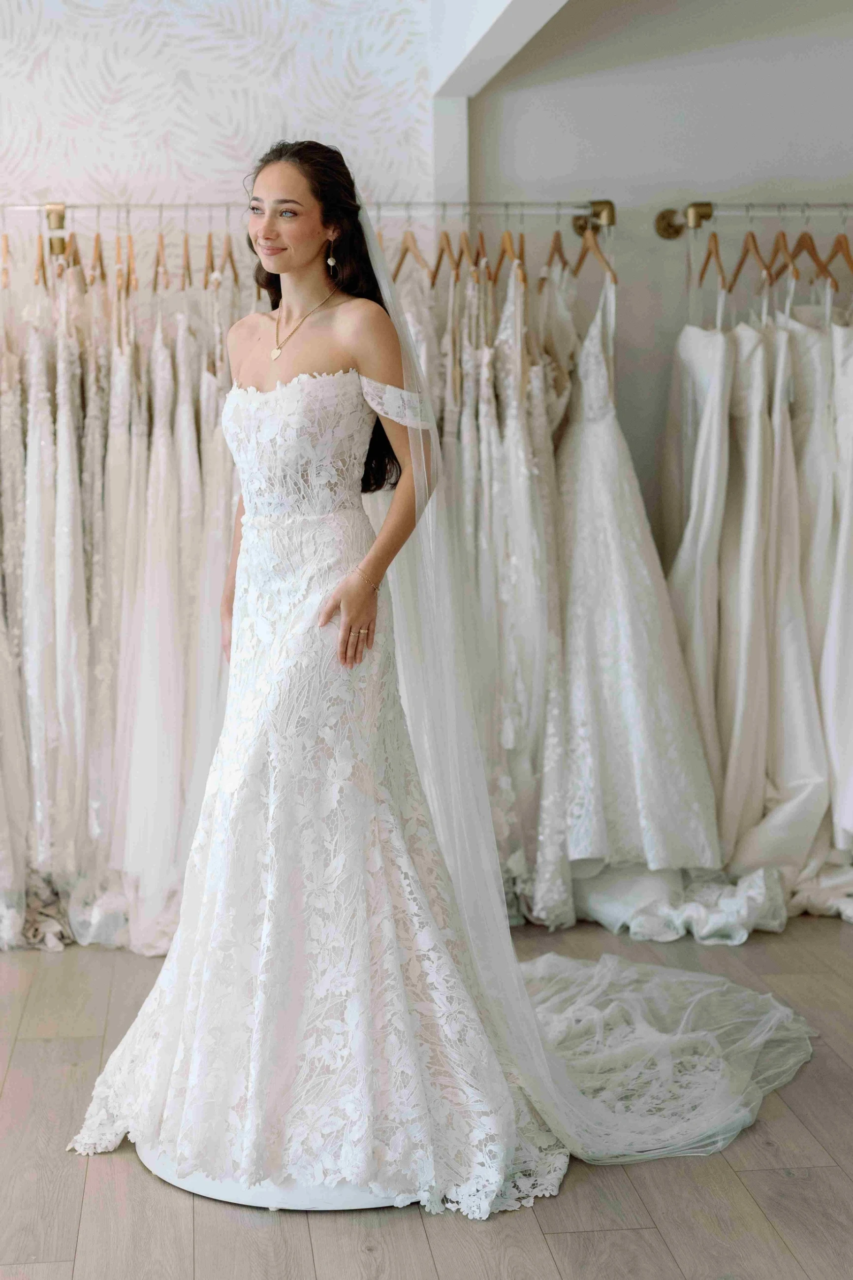 Model wearing a Lillian West Gown